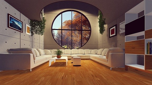 intérieur maison avec canapé et grande ouverture lumineuse